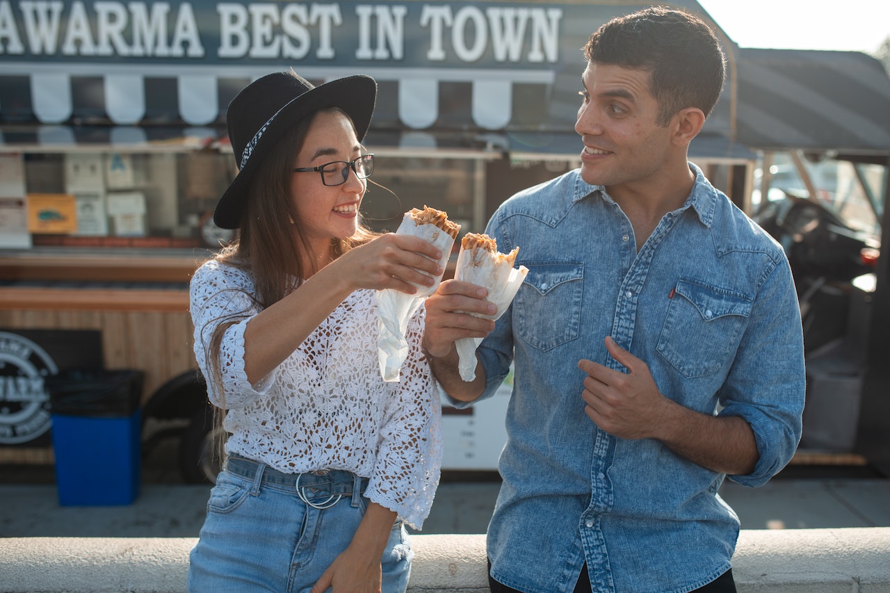 friends smiling while eating